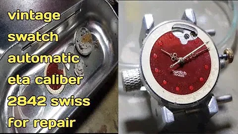 The process of repairing a vintage swatch automatic swiss watch eta 2842, restoration, assembly...